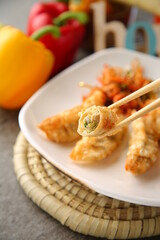 Baked dumplings on a white plate 흰색접시위에 노릇노릇하게 구워진 만두