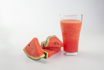 Watermelon smoothie with watermelon slices on white background