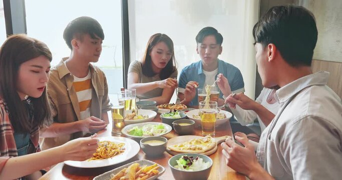 friends dine together in restaurant