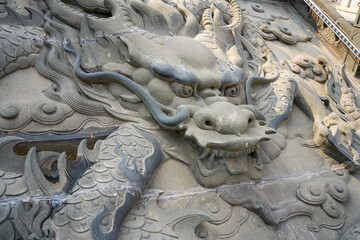 Close-up of ancient Chinese traditional carved dragon slope