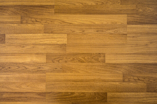Wooden laminate pattern texture background. Wood floor parquet brown colour hardwood
