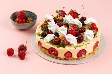 Cheesecake with fruits and berries on top