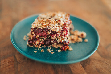 Berry crumble raspberry crisp homemade baking at home. Red berries fruits crisp recipe.