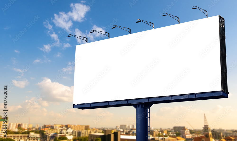 Wall mural mockup large white blank billboard or white promotion poster displayed on the outdoor against the bl