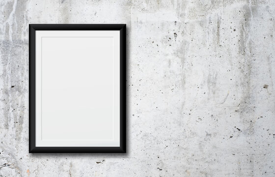 White poster or a white picture frame hanging on the brick wall background in the room.