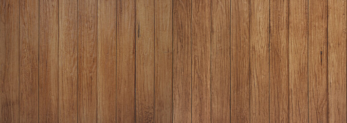 Brown wood texture background coming from natural tree. The wooden panel has a beautiful dark pattern that is empty.