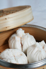 Cantonese dim sum dumplings in bamboo steamer
