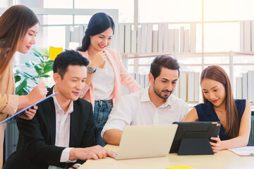 Fototapeta premium businessman and secretary with team business working together using laptop computer at modern office, Lifestyle business work at home concept.