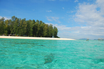 Beautiful blue ocean seascape at Lipe Island in Satun Province, Thailand. Tourists can enjoy , transparent water, corals, marine lives, holiday in summer in Southeast Asia. Wonderful sightseeing