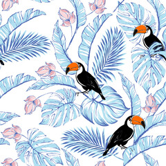Tropical seamless pattern with bird and exotic flowers. Summer background with hibiscus flowers and palm leaves. © Logunova  Elena