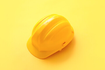 Fototapeta premium New hardhat on color background