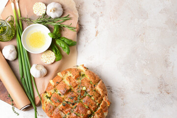 Composition with garlic bread and spices on light background