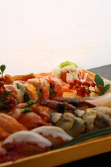 a plate of colorful assorted sushi 형형색색의 다양한 모듬 초밥 한 접시