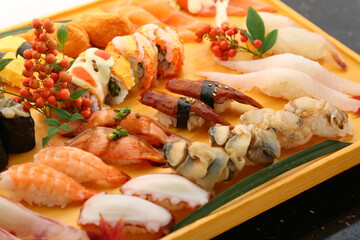 a plate of colorful assorted sushi 형형색색의 다양한 모듬 초밥 한 접시