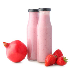 Bottles of tasty berry smoothie on color background