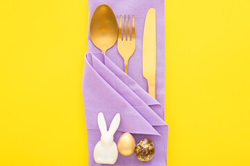 Beautiful table setting for Easter celebration on color background