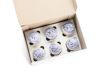 Box with tasty cupcakes on white background