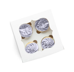 Box with tasty cupcakes on white background