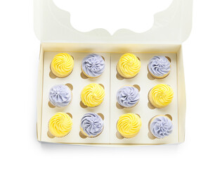 Box with tasty cupcakes on white background