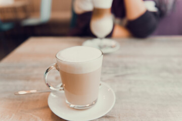 cappuccino cup on table in cafe