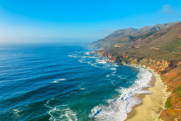 Fototapeta na wymiar Aerial view from a drone, beautiful coastal landscape on Pacific Highway 1, traveling south to Los Angeles, Big Sur, California. Concept, vacation, tourism