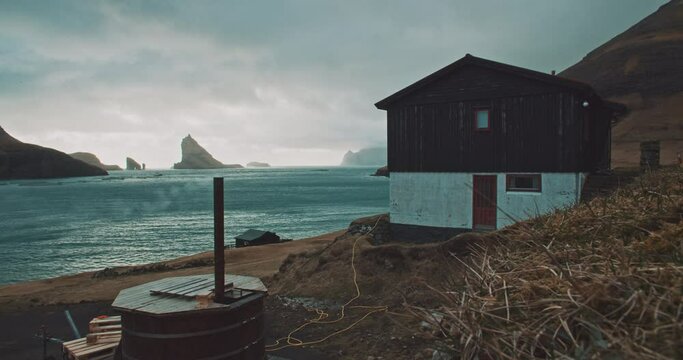 Tiny house in front of the ocean