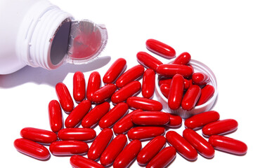 red pills isolated on white background