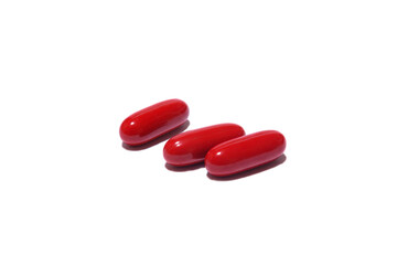 red pills isolated on white background