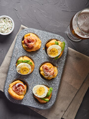 Yorkshire pudding served with avocado sauce and beer
