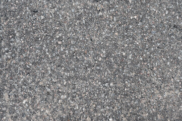 Light grey asphalt road texture, top view.
