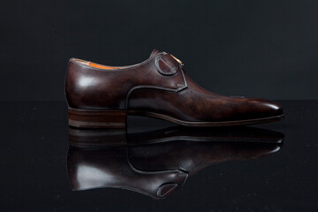 Man's shoes on black background