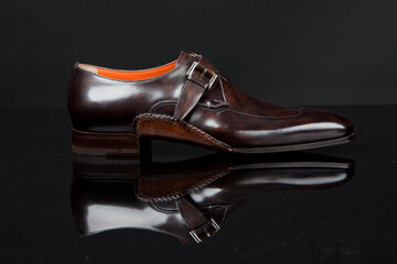 Man's shoes on black background