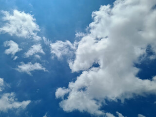 The sky and the sun were shining, covered with clouds.