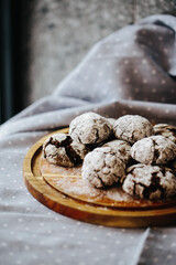 a plate of cakes, only from the oven, sprinkled with powdered sugar