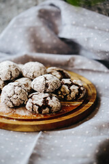 a plate of cakes, only from the oven, sprinkled with powdered sugar