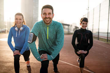 Friends fitness training together outdoors living active healthy lifestyle