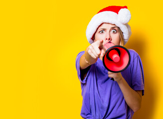 girl  in Christmas hat with pink megaphone