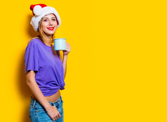 girl in Christmas hat and cup