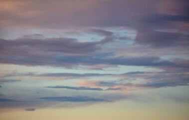 Rain clouds in the sky at sunset