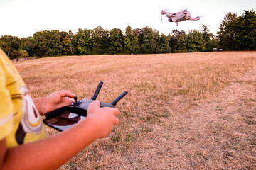 Point of view perspective of young person flying a drone