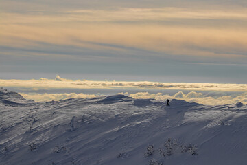 Skier on top of a mountain