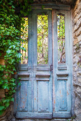 Fototapeta na wymiar Old Garden Door in the Village of Menerbes, Provence, France
