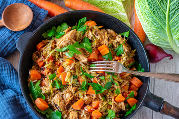 slow cooked turkey breast with brown rice, cabbage and carrot vegetables