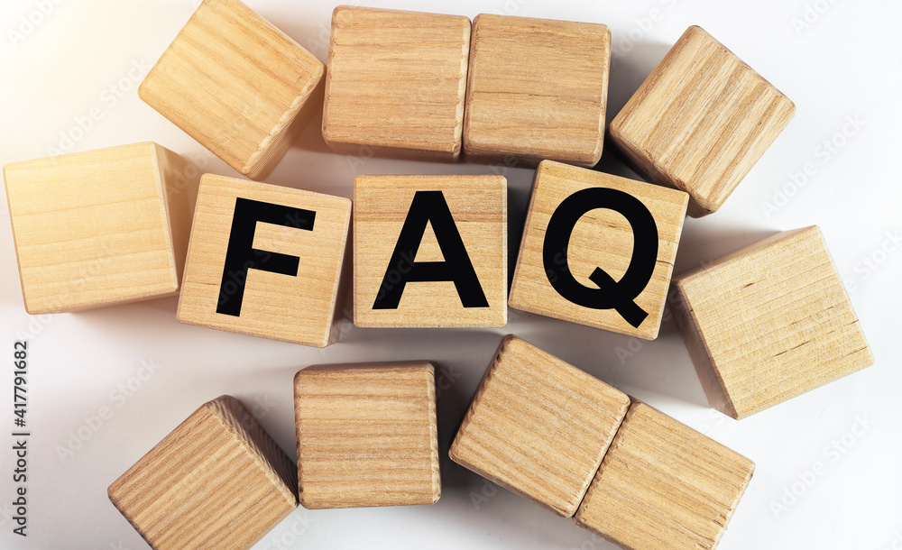 Poster faq and qa concept. inscription on wooden dices