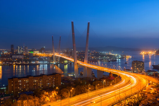 Zolotoy Bridge (Golden Bridge) at night - cable-stayed bridge over the Golden Horn Bay in Vladivostok, Russia