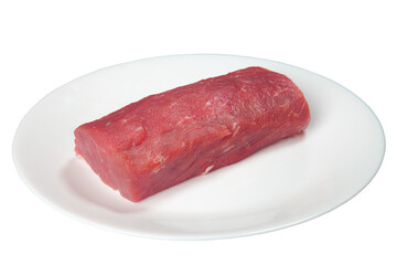 Pieces of raw meat on a white plate