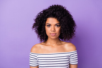 Photo of gorgeous wavy hairdo young dark skin lady look camera composed face isolated on violet color background