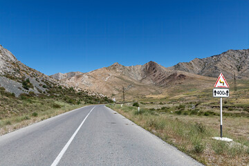 Road through the Karatau Mountains in southern Kazakhstan in summer