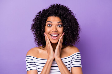 Fototapeta na wymiar Photo of astonished funny dark skin person arms on cheeks open mouth isolated on violet color background