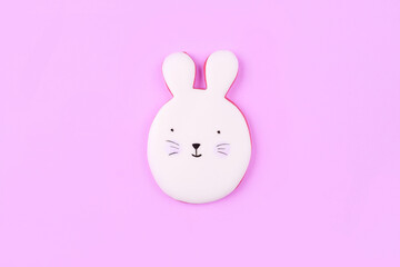 Fototapeta premium Easter bunny cookies on lilac background. Spring holiday.